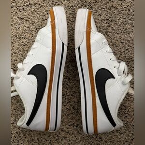 Nike White Sneakers with Black and Orange Details